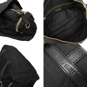 Miu Miu shoulder gold leather black bag